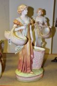 A PAIR OF EARLY 20TH CENTURY ROYAL DUX STYLE FIGURES OF FEMALE FLOWER SELLERS, height 46cm, marked