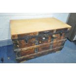 A VINTAGE STORAGE TRUNK, with leather and wooden banding, width 92cm x depth 55cm x height 58cm (