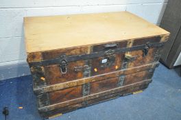 A VINTAGE STORAGE TRUNK, with leather and wooden banding, width 92cm x depth 55cm x height 58cm (