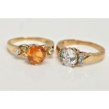 TWO 9CT GOLD GEM SET DRESS RINGS, the first centring on a four claw set, circular cut citrine,