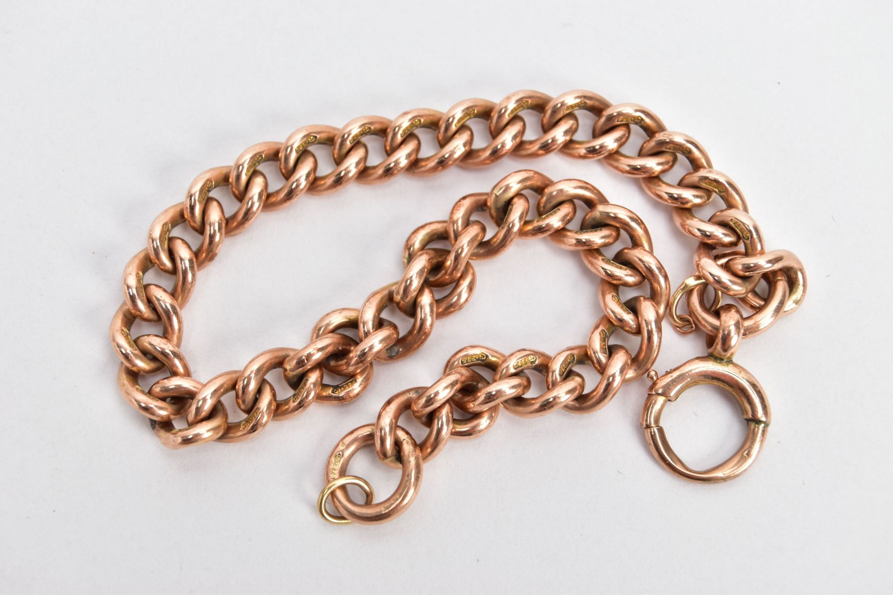 A ROSE GOLD BRACELET, curb link bracelet each link stamped 9.375, fitted with a bolt ring clasp - Image 2 of 2