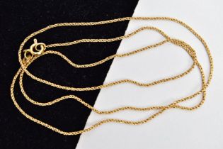 A YELLOW METAL ROPE TWIST CHAIN, fitted with a spring clasp stamped 750 Italian 1 AR marks, length