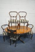 A SET OF FOUR VICTORIAN ROSEWOOD BALLOON BACK CHAIRS, with stripped upholstery (condition:-one chair