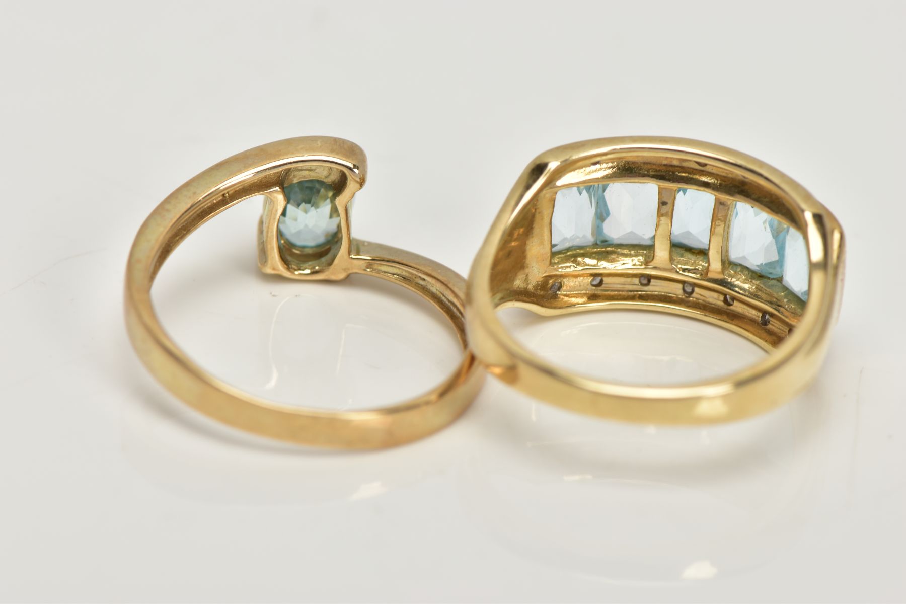 TWO 9CT GOLD GEM SET DRESS RINGS, the first centring on a slightly raised row of five rectangular, - Image 4 of 4