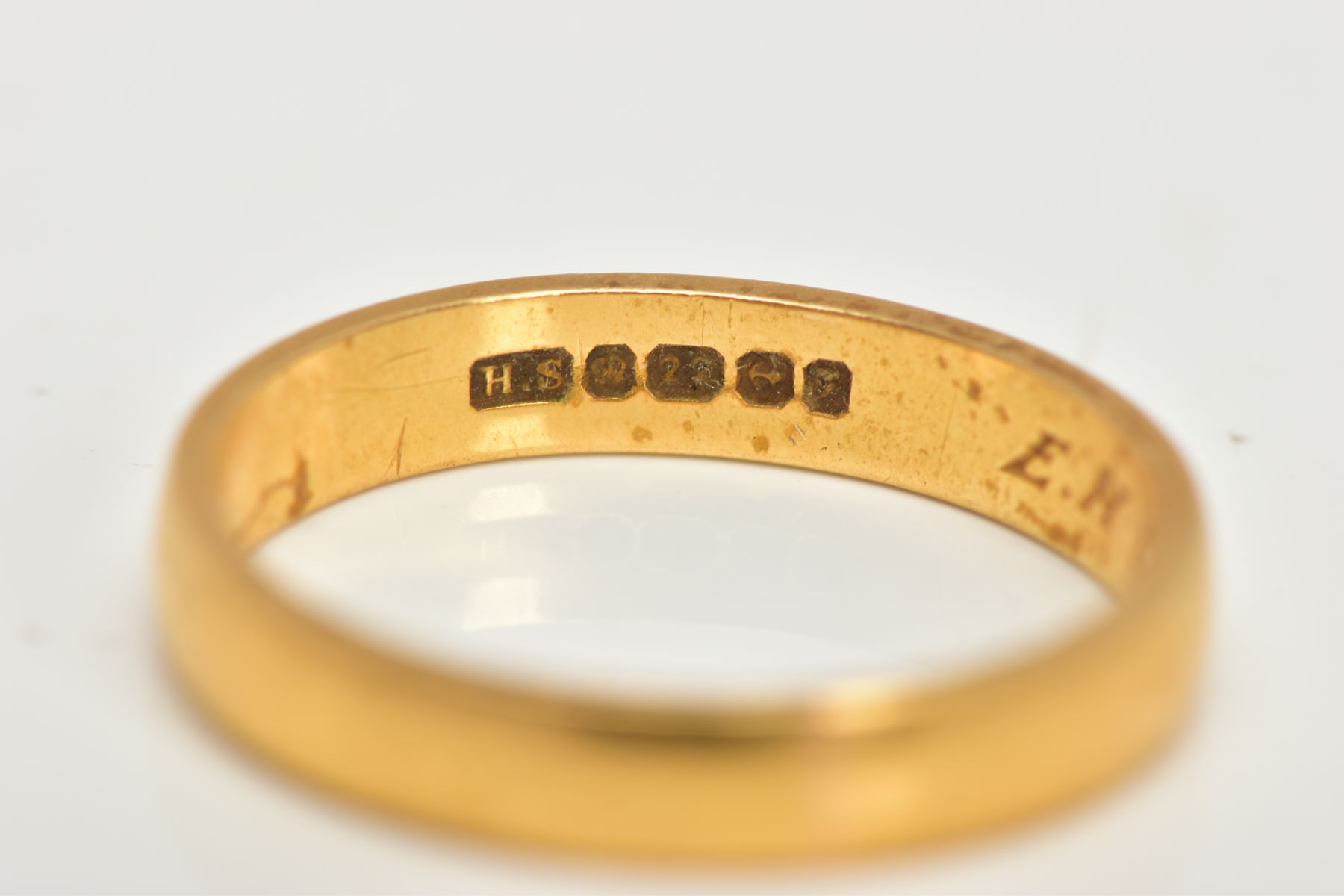 A 22CT GOLD BAND RING, plain polished band, approximate band width 3.4mm, personal engraving to - Image 2 of 2