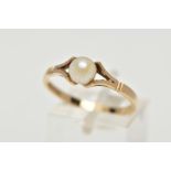 A 9CT YELLOW GOLD CULTURED PEARL RING, set with a part drilled cultured pearl, measuring