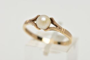 A 9CT YELLOW GOLD CULTURED PEARL RING, set with a part drilled cultured pearl, measuring
