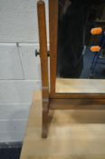 A 1930'S OAK SWINGING DRESSING MIRROR, possibly by Heals & Sons, width 61cm x depth 26cm x height