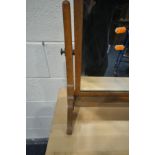 A 1930'S OAK SWINGING DRESSING MIRROR, possibly by Heals & Sons, width 61cm x depth 26cm x height