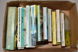A BOX OF BOOKS BY AND ABOUT ARTHUR RANSOME, eleven titles to include a first edition (1988) of Coots