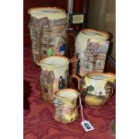 FIVE ROYAL DOULTON CHARLES DICKENS RELIEF MOULDED SERIES WARE JUGS, largest 19.5cm, D6394, featuring