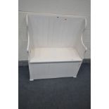 A WHITE PAINTED PINE HALL SETTLE, width 91cm x depth 40cm x height 106cm with loose cushions