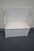 A WHITE PAINTED PINE HALL SETTLE, width 91cm x depth 40cm x height 106cm with loose cushions