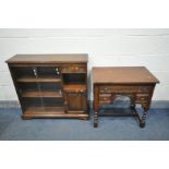 AN OLD CHARM OAK KNEE HOLE DESK, the forward moving top enclosing a secret compartment, over three