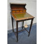 AN EDWARDIAN MAHOGANY AND BOX STRUNG INLAID LADIES DESK, the raised back with a brass gallery and
