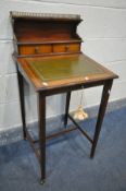 AN EDWARDIAN MAHOGANY AND BOX STRUNG INLAID LADIES DESK, the raised back with a brass gallery and