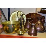 A QUANTITY OF BRASS AND COPPERWARE, comprising of three Georgian copper measuring jugs (quart,