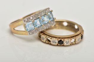 TWO 9CT GOLD GEM SET DRESS RINGS, the first centring on a row of four square cut light blue topaz,