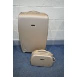 A REVOLUTION GOLD HARD SHELL SUITCASE, and a matching hand luggage bag (2)
