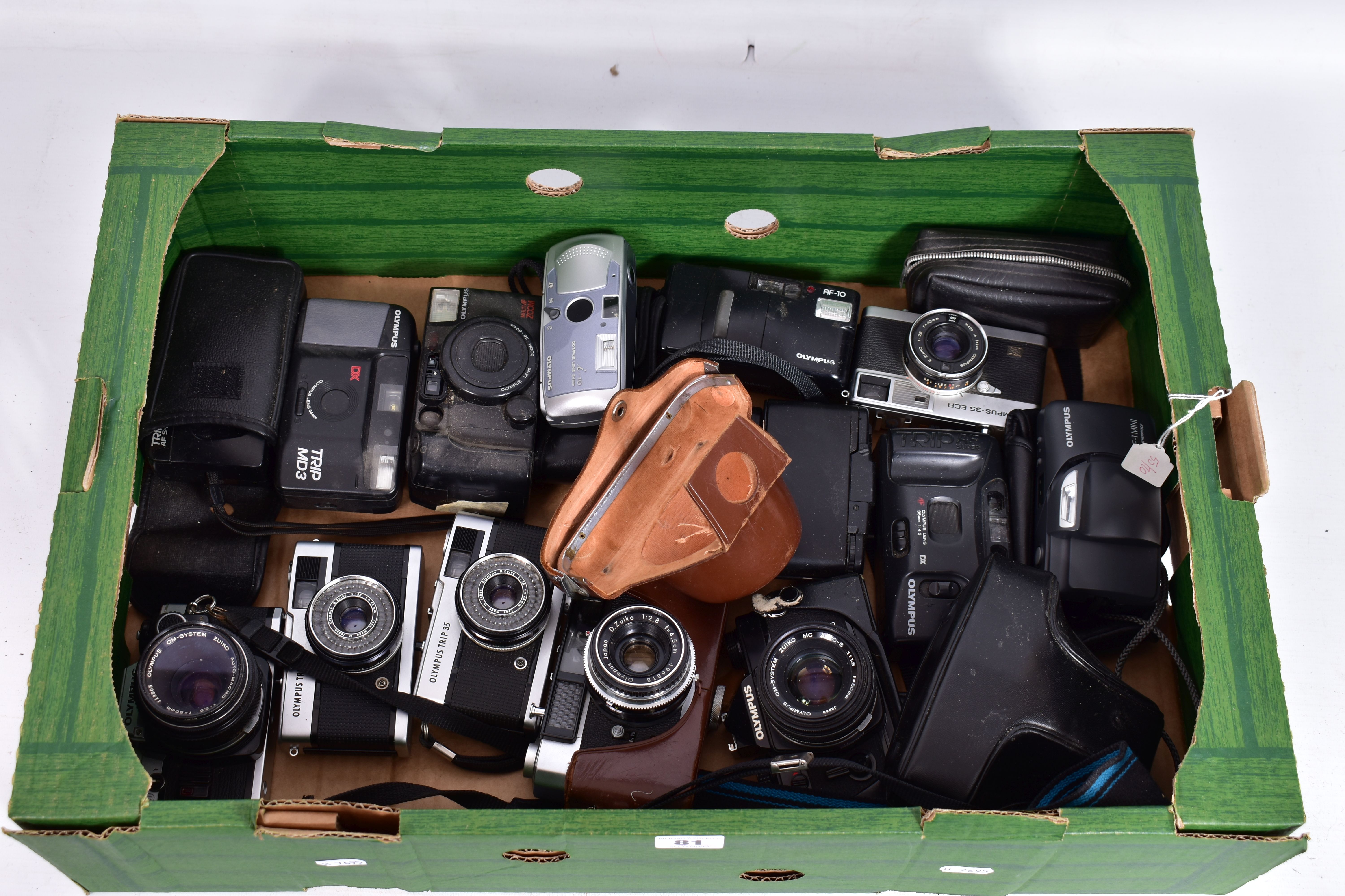 A TRAY CONTAINING OLYMPUS SLR AND INSTANT CAMERAS including a black OM2 with 50mm lens, a chrome