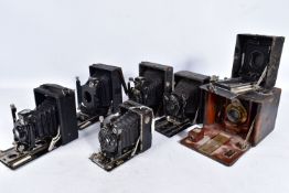 SEVEN FOLDING PLATE CAMERAS including a Rietzchel Miniature Clack 1, two with Kukos ll markings to