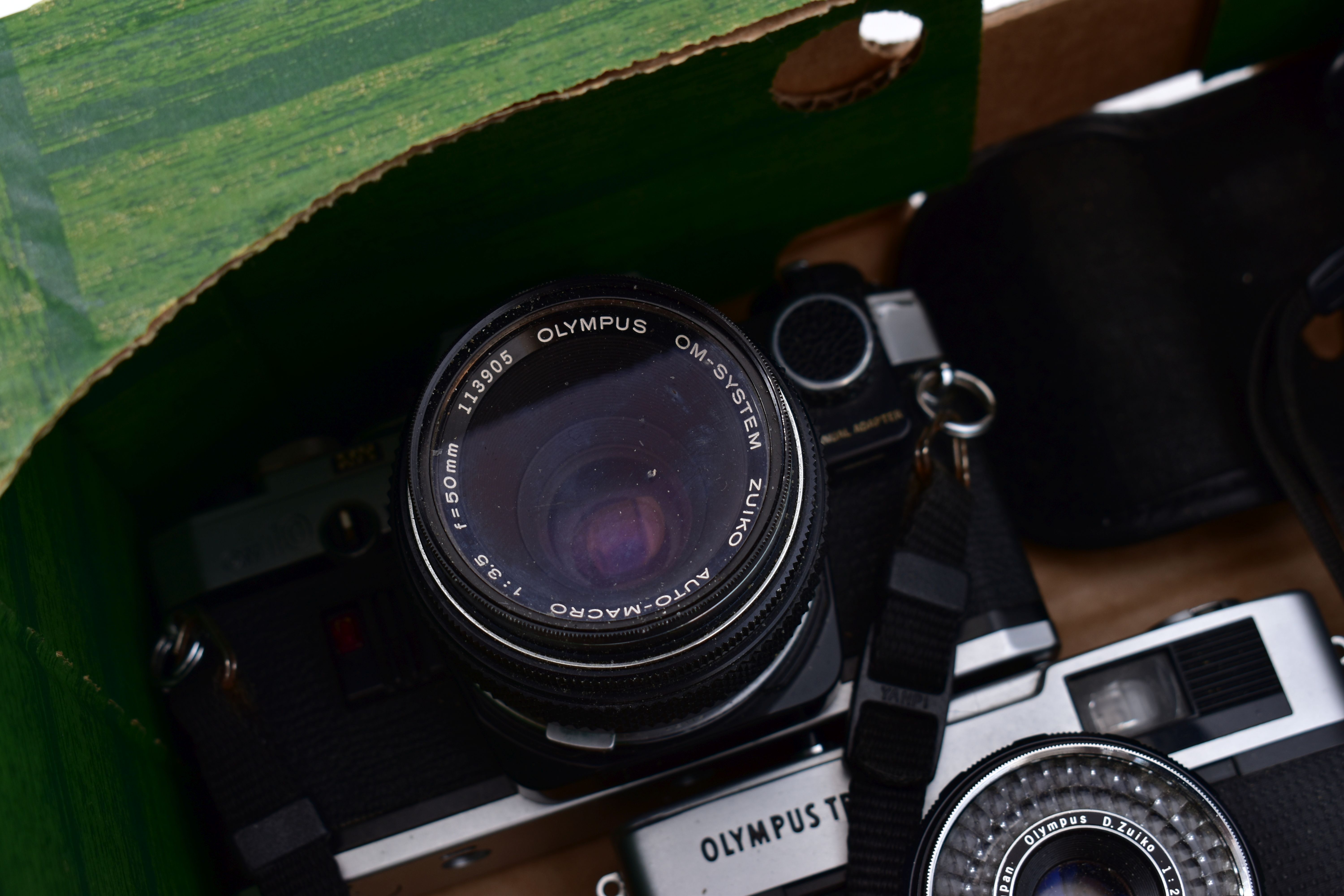 A TRAY CONTAINING OLYMPUS SLR AND INSTANT CAMERAS including a black OM2 with 50mm lens, a chrome - Image 5 of 5