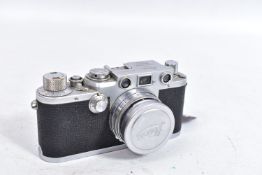 A 1951-2 LEICA lllf RANGEFINDER CAMERA Ser.No. 595250 fitted with a Summitar 5cm f2 lens Ser.No