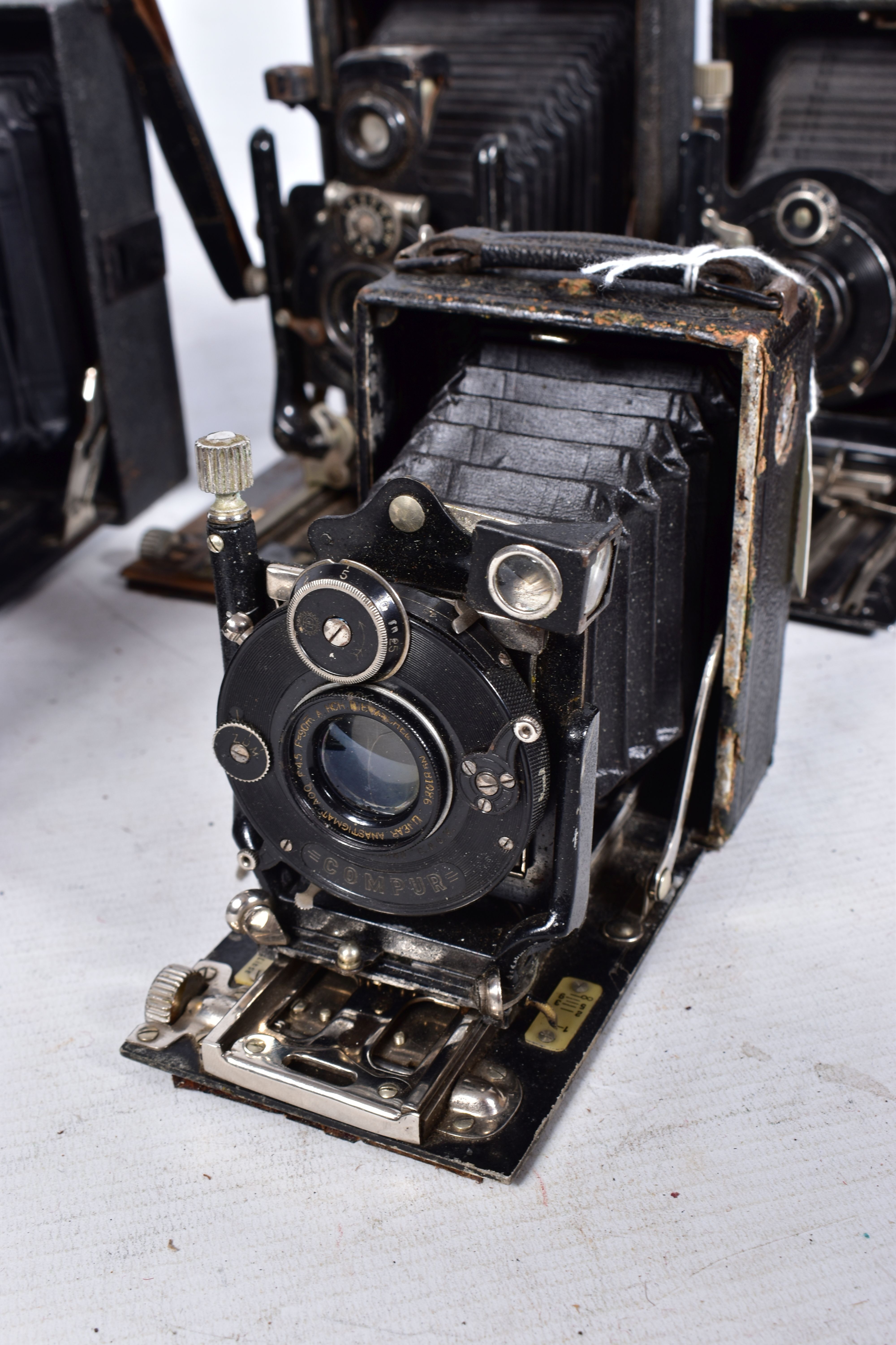 SEVEN FOLDING PLATE CAMERAS including a Rietzchel Miniature Clack 1, two with Kukos ll markings to - Image 3 of 7