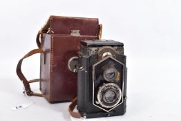 AN IKOFLEX 850/16 EARLY COFFEE CAN TLR CAMERA in leather case ( missing lens surround)