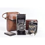 A NEWMAN AND GUARDIA BABY 'SIBYL' FOLDING CAMERA with leather case ( rear panel missing)