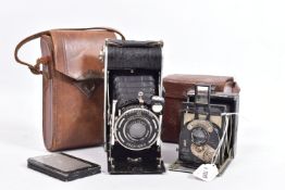 A NEWMAN AND GUARDIA BABY 'SIBYL' FOLDING CAMERA with leather case ( rear panel missing)