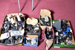 FOUR TRAYS CONTAINING VINTAGE CAMERA PARTS AND LENS PARTS