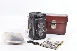 A ROLLEIFLEX 6RF 421 TLR CAMERA fitted with a Heidoscop- Anistigmat 7.5cm f3.1 lens and a Tessar 7.