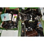 THREE TRAYS CONTAINING CANON CAMERAS AND LENSES including an EOS 1n film SLR body, a Demi, a Demi C,