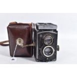A ROLLEIFLEX 6RF Mod 422 TLR CAMERA in leather case, with f 3.1 and 3.5 7.5cm lenses