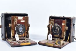 TWO SANDERSON FIELD CAMERAS including a Deluxe with black fabric finish over mahogany frame,