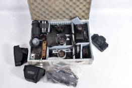 AN ALUMINIUM CAMERA CASE CONTAINING YASHICA CAMERAS AND LENSES models including a Contax 167MT