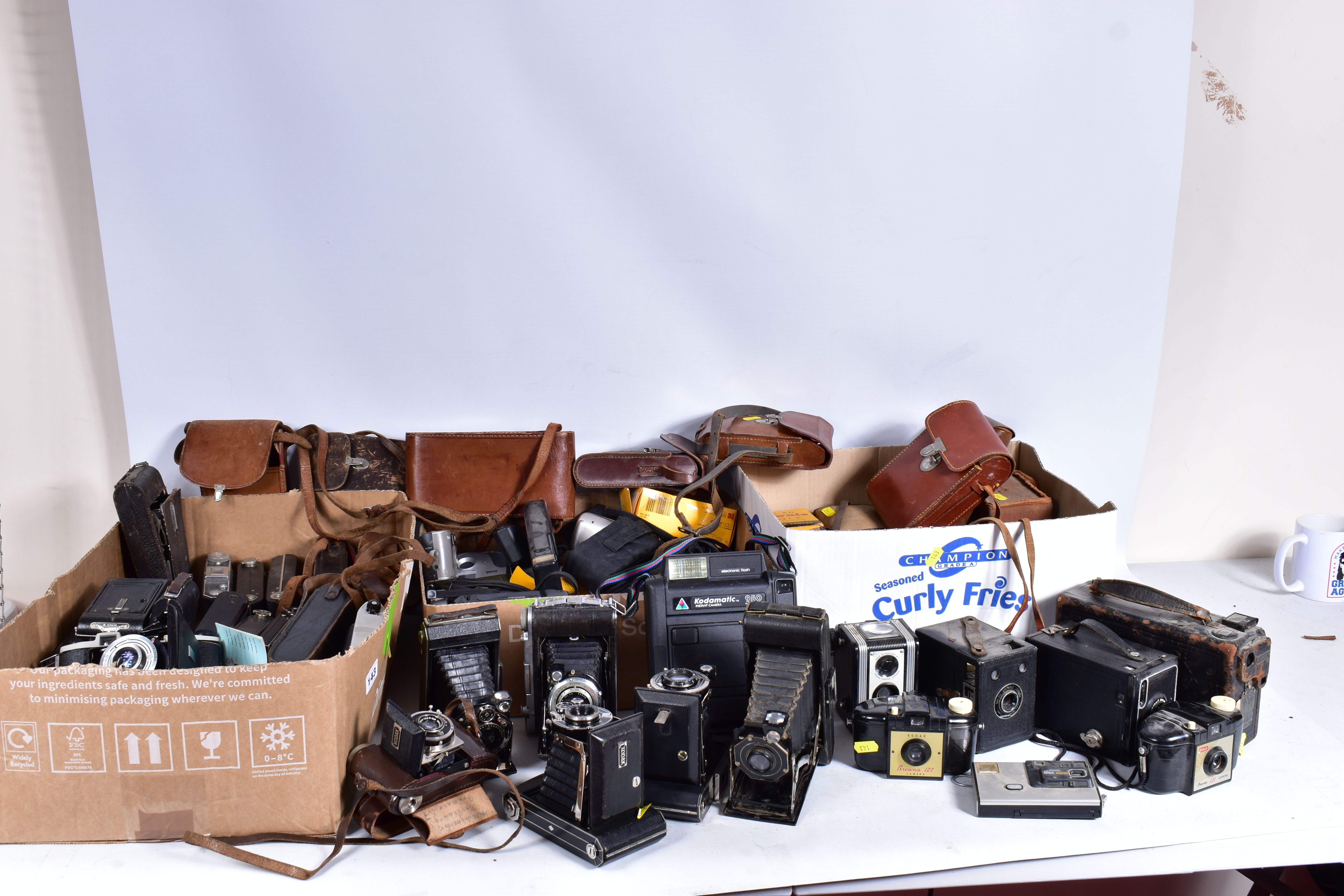 THREE TRAYS CONTAINING KODAK CAMERAS including twenty one folding of various models, twelve