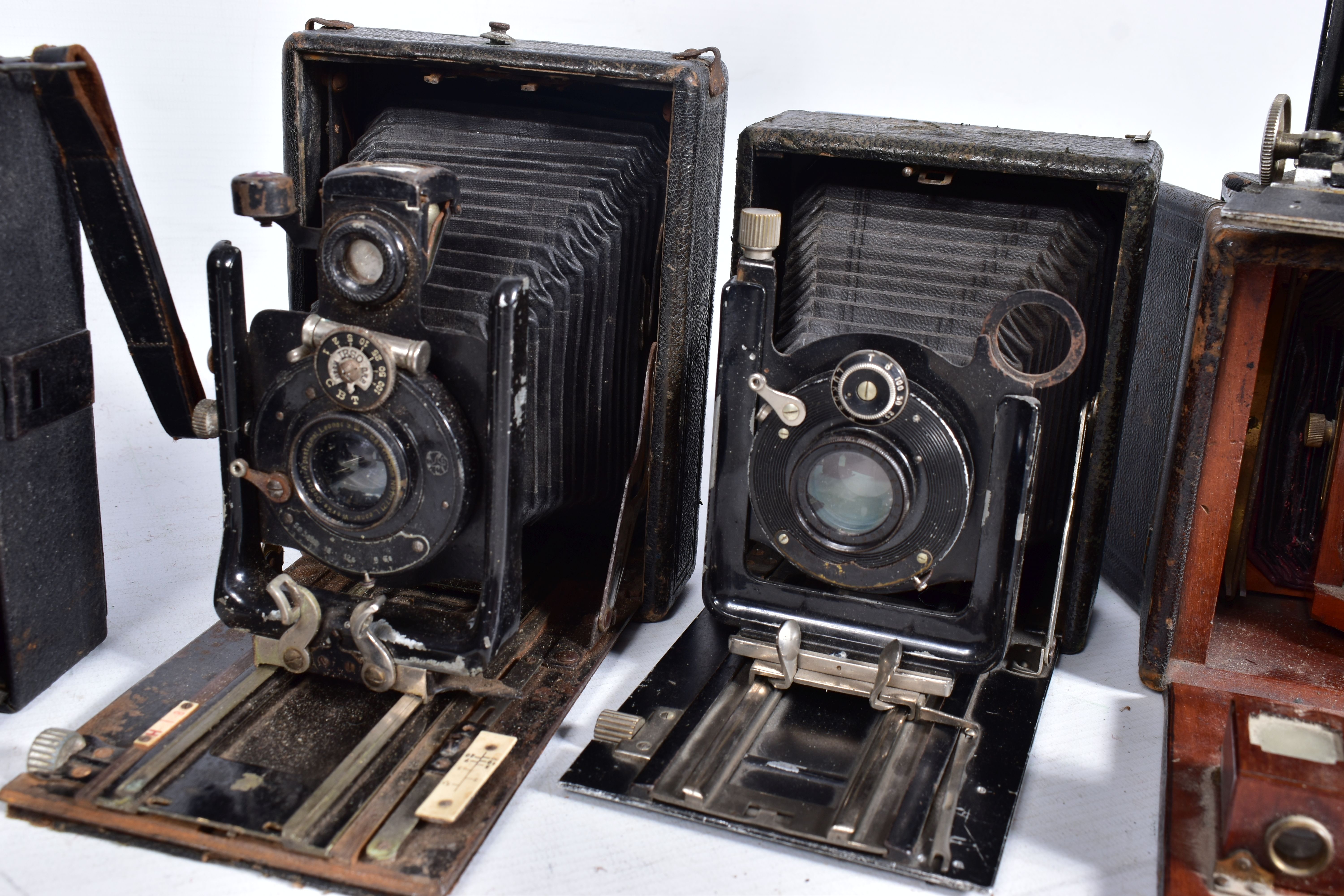 SEVEN FOLDING PLATE CAMERAS including a Rietzchel Miniature Clack 1, two with Kukos ll markings to - Image 5 of 7