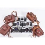 FOUR VINTAGE KIEV RANGEFINDER FILM CAMERAS comprising of four 4s with various lenses fitted in