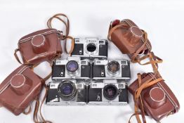 FOUR VINTAGE KIEV RANGEFINDER FILM CAMERAS comprising of four 4s with various lenses fitted in