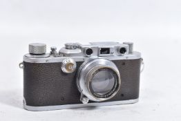 A 1938 LEICA lllA RANGEFINDER CAMERA with a Summar 5cm f2 lens( very tidy cosmetically some brassing