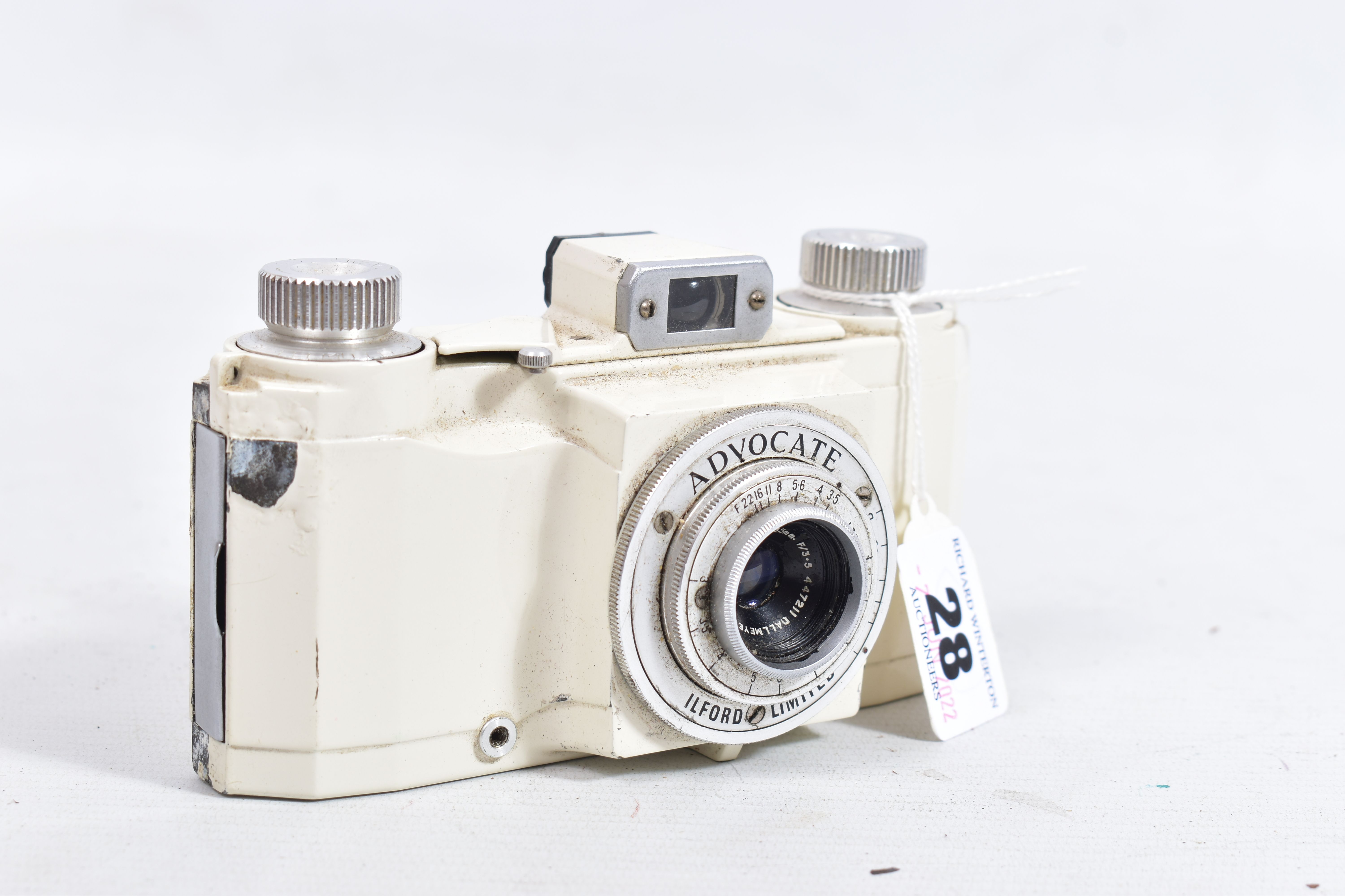 AN ILFORD ADVOCATE IN CREAM FINISH with a Dallmeyer lens ( some paint blooming on underside)