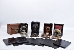 A COLLECTION OF FOUR FOLDING CAMERAS including a Sands and Hunter for 5x3 1/2 plates with a Goerz