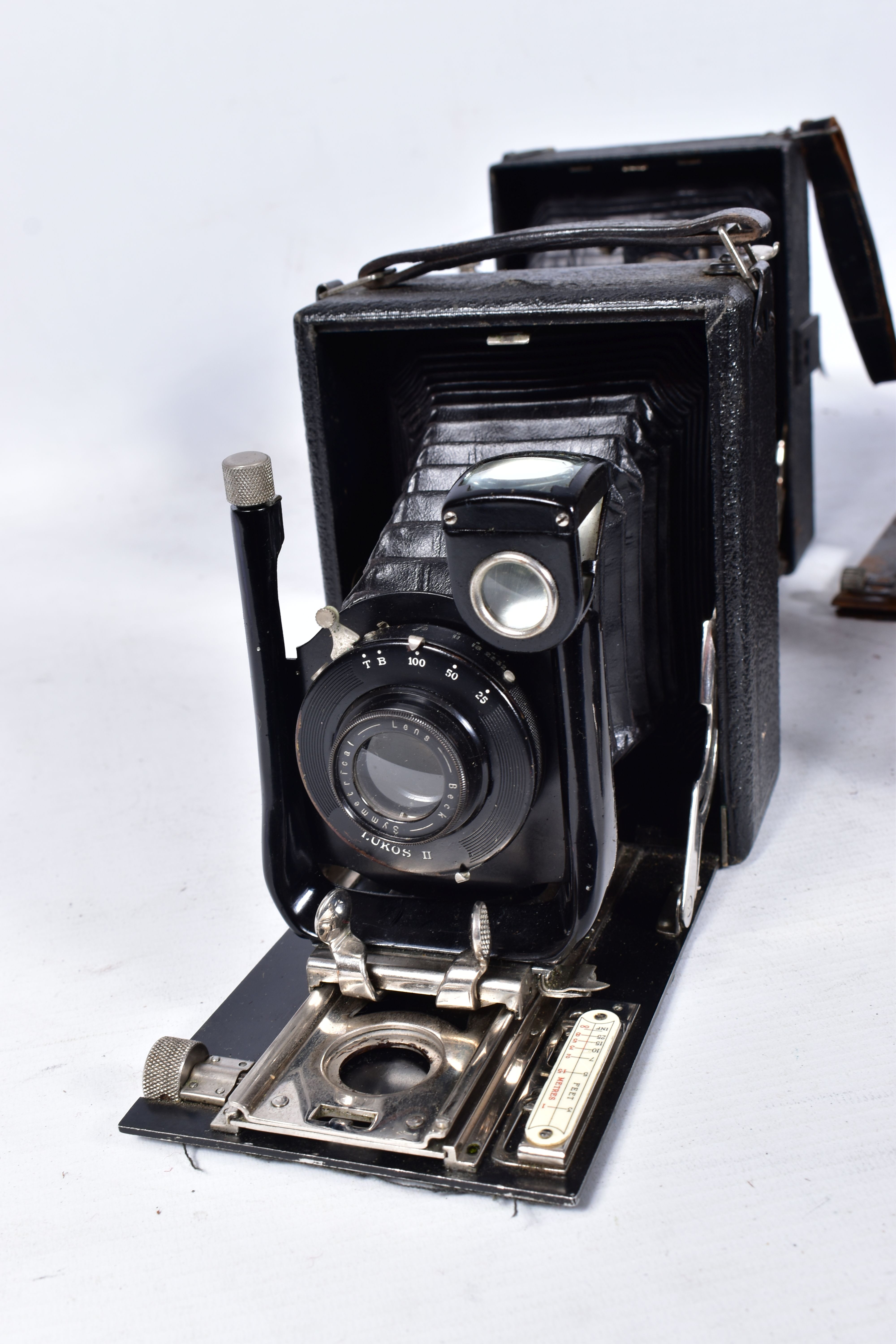 SEVEN FOLDING PLATE CAMERAS including a Rietzchel Miniature Clack 1, two with Kukos ll markings to - Image 2 of 7