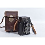 A ZEISS IKON IKOFLEX 850/16 LATER 'COFFEE CAN' TLR CAMERA in leather case