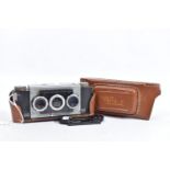 A WHITE STEREO REALIST 1042 STEREO FILM CAMERA with leather case ( camera is ok condition, shutter