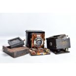 A SANDERSON FOLDING CAMERA with mahogany and brass construction and leather outer finish, Koilos