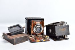 A SANDERSON FOLDING CAMERA with mahogany and brass construction and leather outer finish, Koilos