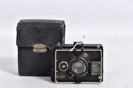 AN ICA-BEBE STRUT FOLDING CAMERA with a CZJ 7.5cm lens and leather case